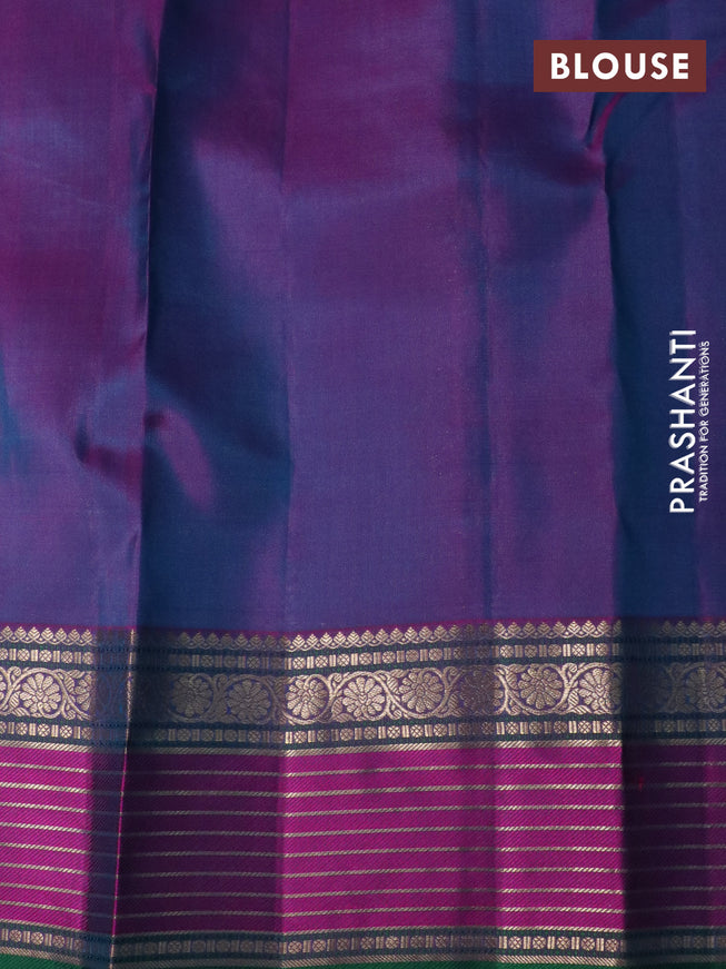 Pure kanchipuram silk saree dual shade of teal bluish green and pink with allover zari woven buttas and rich zari woven border