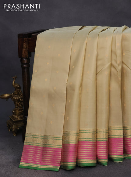 Pure kanchipuram silk saree elaichi green and pink with allover zari woven buttas and rich zari woven border