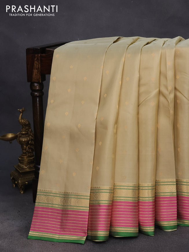 Pure kanchipuram silk saree elaichi green and pink with allover zari woven buttas and rich zari woven border