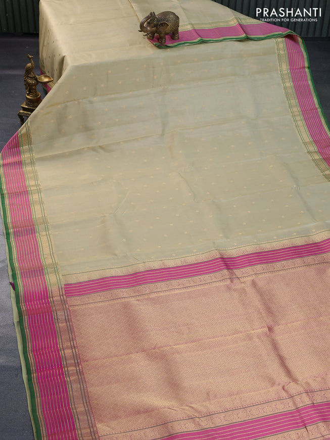 Pure kanchipuram silk saree elaichi green and pink with allover zari woven buttas and rich zari woven border