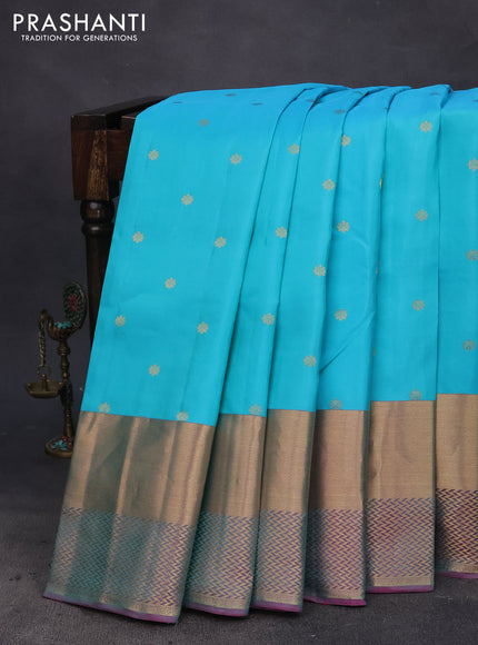 Pure kanchipuram silk saree light blue and dual shade of pink with allover zari woven buttas and long zari woven border