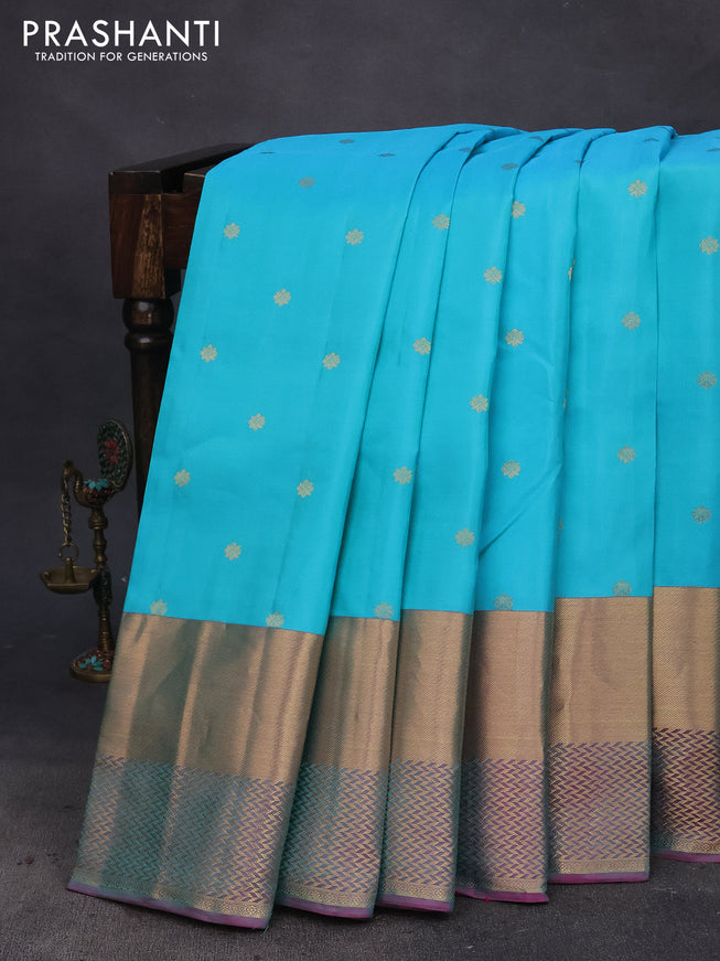 Pure kanchipuram silk saree light blue and dual shade of pink with allover zari woven buttas and long zari woven border