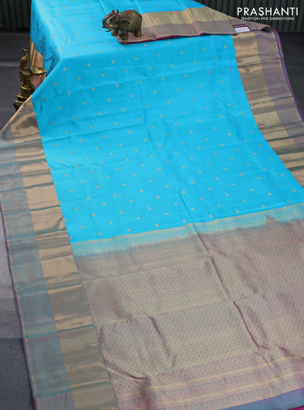 Pure kanchipuram silk saree light blue and dual shade of pink with allover zari woven buttas and long zari woven border