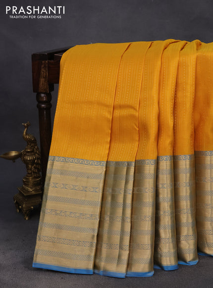 Pure kanchipuram silk saree mango yellow and blue with allover zari weaves and long zari woven border