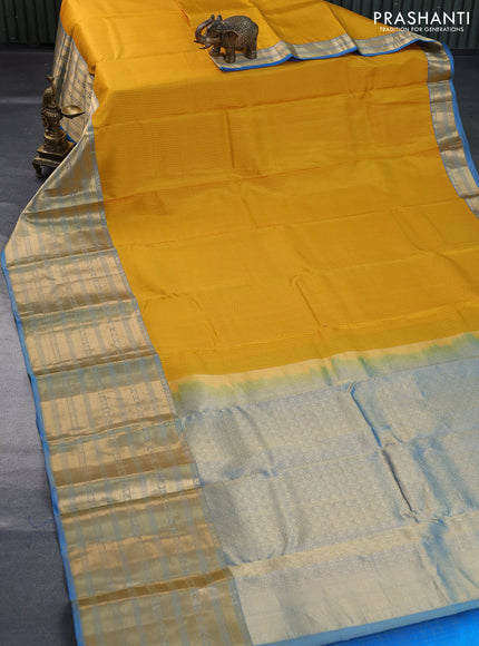 Pure kanchipuram silk saree mango yellow and blue with allover zari weaves and long zari woven border