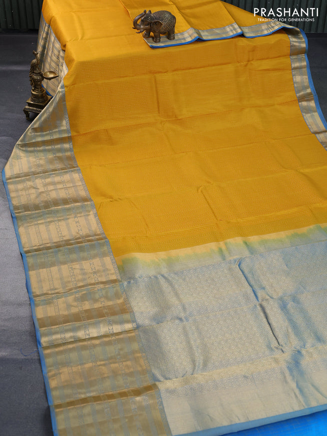 Pure kanchipuram silk saree mango yellow and blue with allover zari weaves and long zari woven border