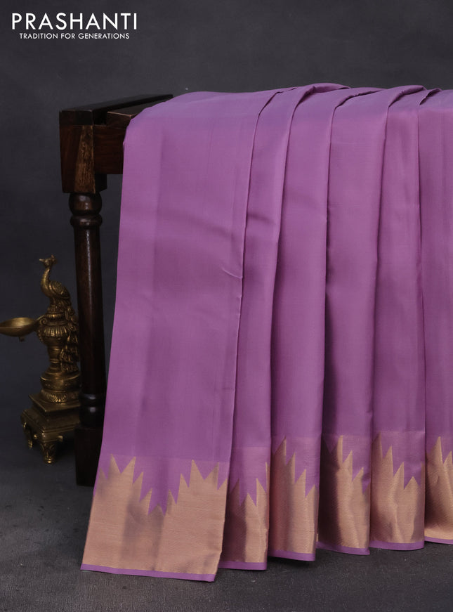 Pure kanchipuram silk saree lavender with plain body and temple zari woven border