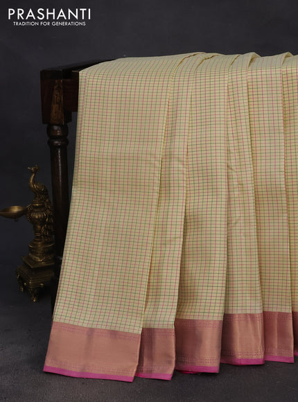 Pure kanchipuram silk saree cream and dual shade of pink with allover checked pattern and zari woven border