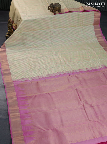 Pure kanchipuram silk saree cream and dual shade of pink with allover checked pattern and zari woven border