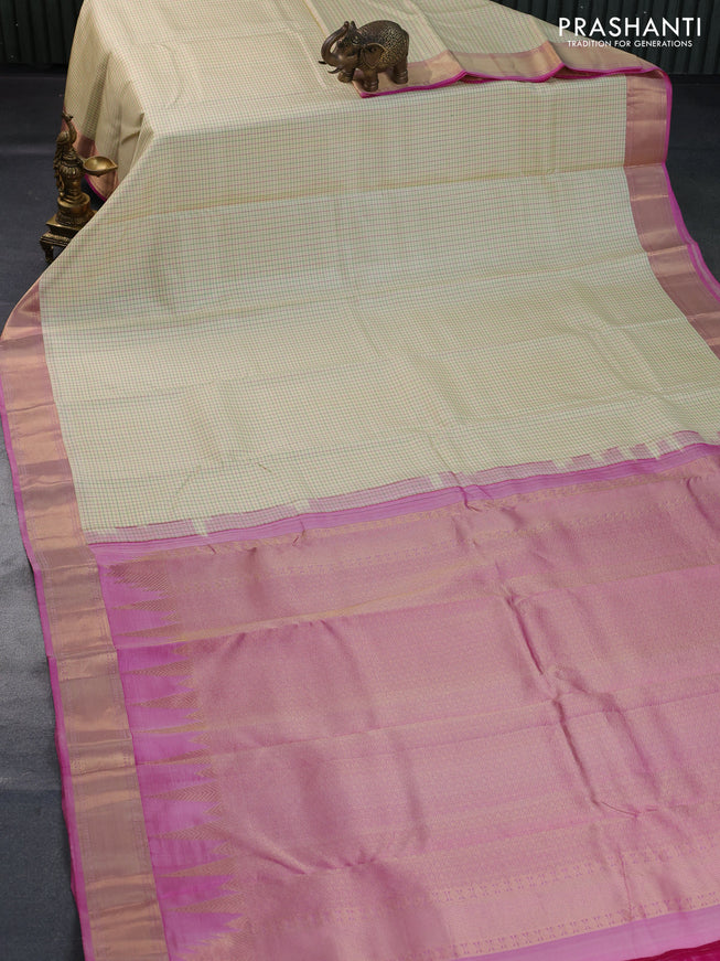 Pure kanchipuram silk saree cream and dual shade of pink with allover checked pattern and zari woven border