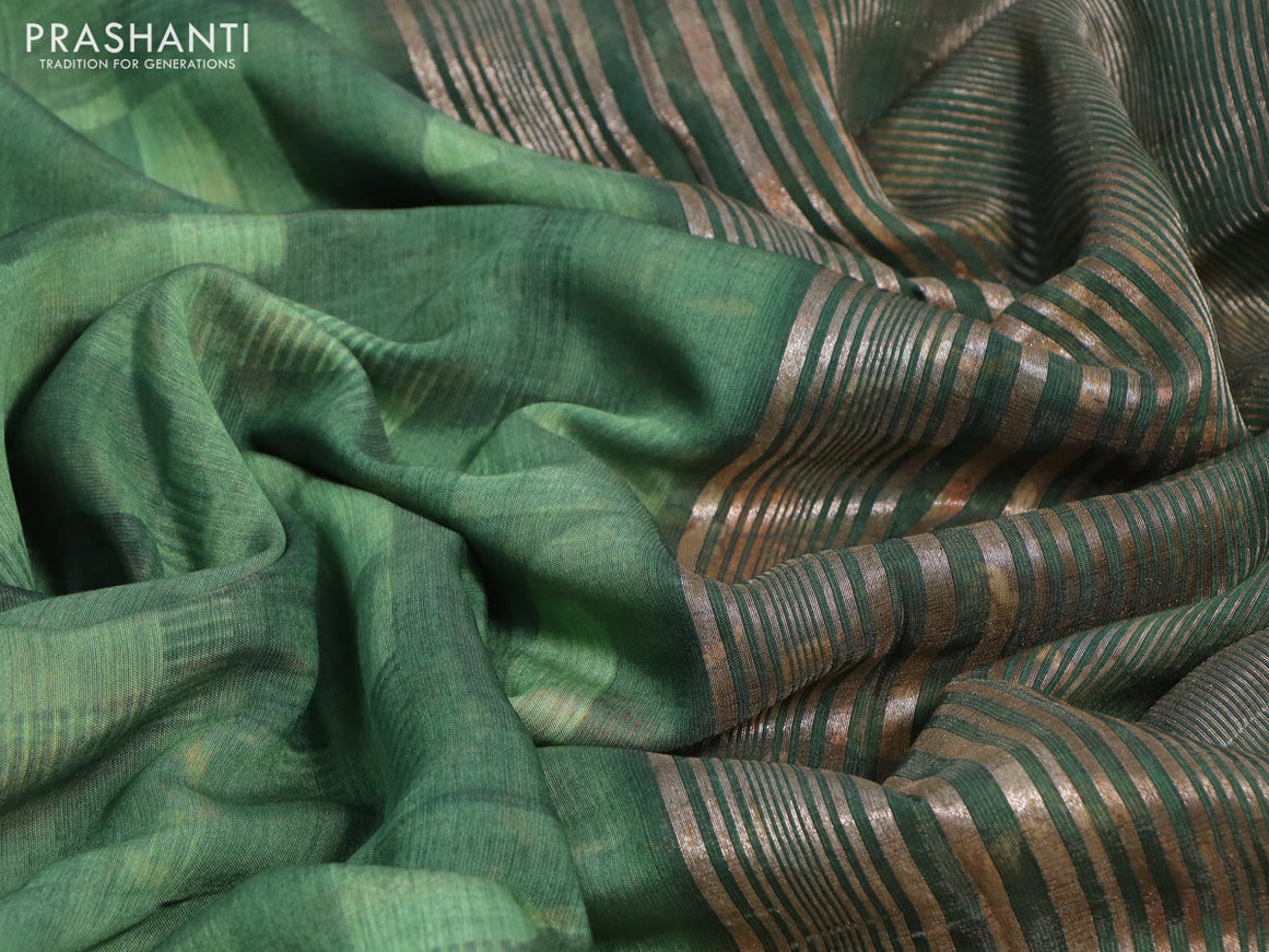 Muslin silk saree green and off white with allover stripes pattern and rettapet zari woven kalamkari printed border