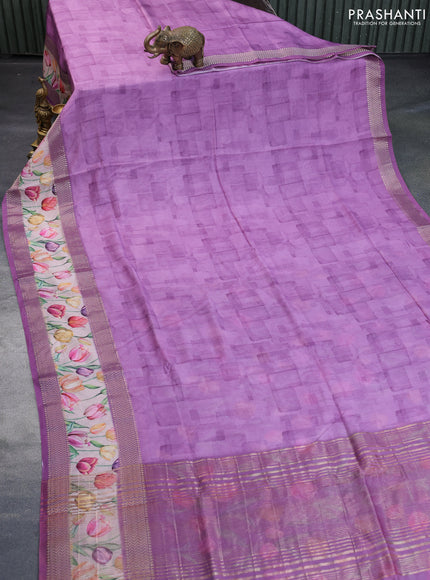 Muslin silk saree lavender shade and cream with allover prints and rettapet zari woven floral printed border