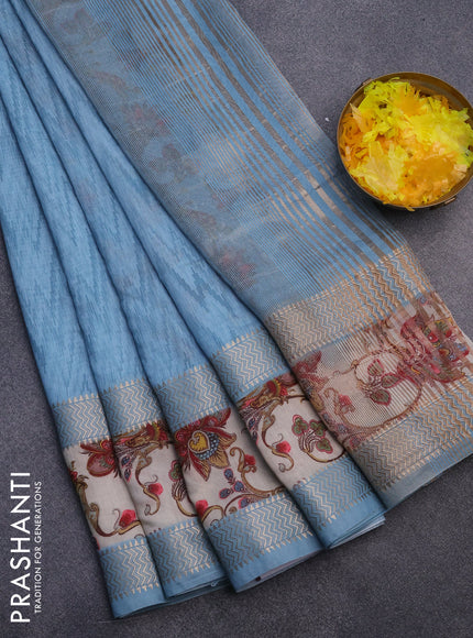 Muslin silk saree light blue shade and beige with allover ikat weaves and rettapet zari woven printed border