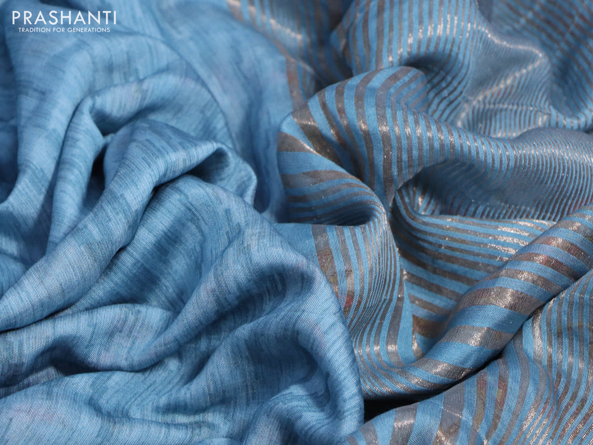 Muslin silk saree light blue shade and beige with allover ikat weaves and rettapet zari woven printed border