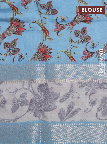 Muslin silk saree light blue shade and beige with allover ikat weaves and rettapet zari woven printed border