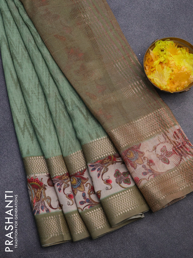 Muslin silk saree pastel green and beige with allover ikat weaves and rettapet zari woven printed border