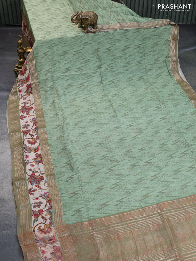 Muslin silk saree pastel green and beige with allover ikat weaves and rettapet zari woven printed border