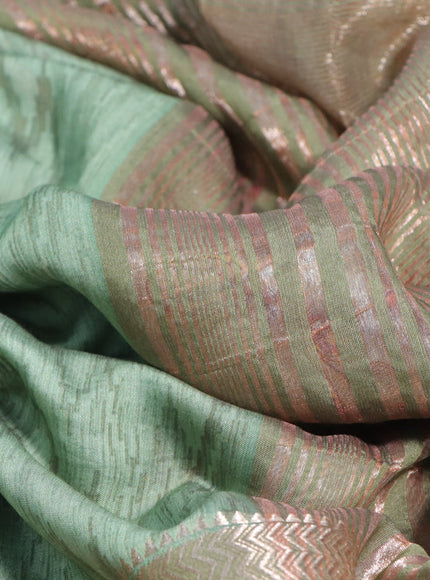 Muslin silk saree pastel green and beige with allover ikat weaves and rettapet zari woven printed border