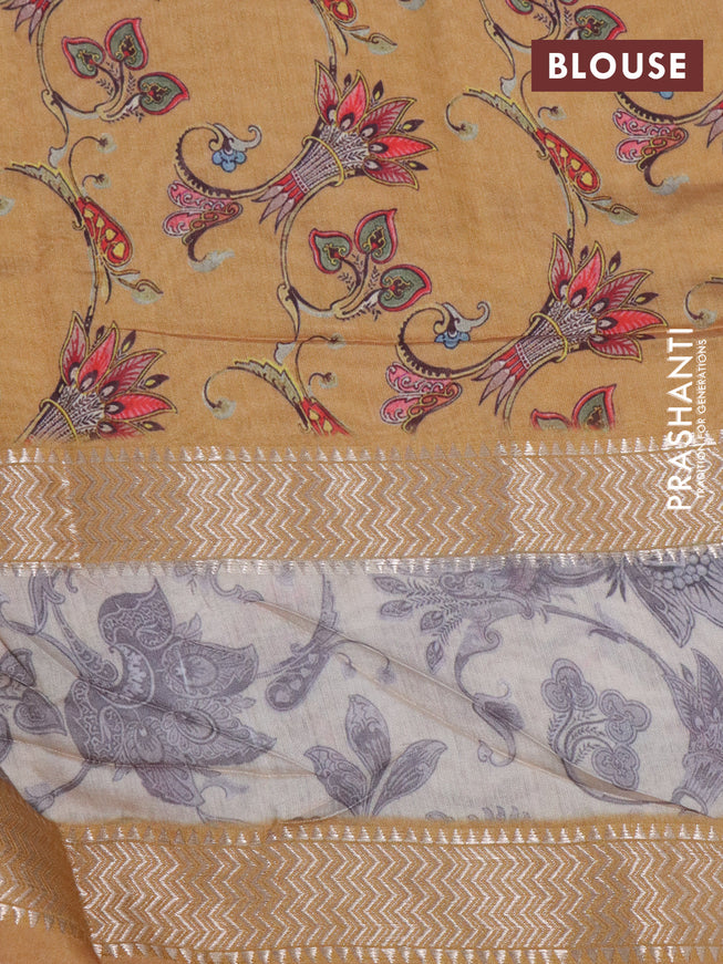 Muslin silk saree mustard yellow and beige with allover ikat weaves and rettapet zari woven printed border