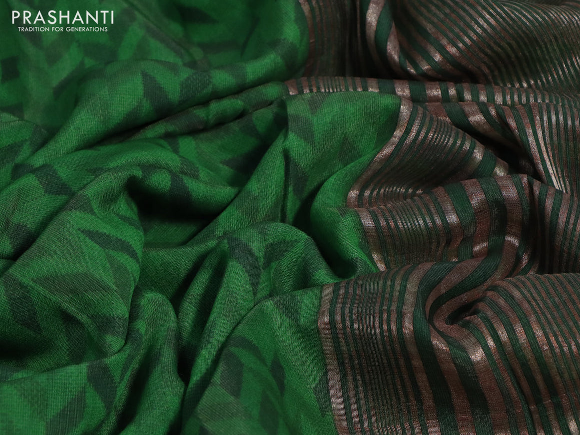 Muslin silk saree green and off white with allover prints and rettapet zari woven printed border