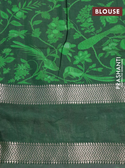 Muslin silk saree green and off white with allover prints and rettapet zari woven printed border