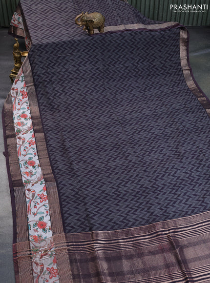 Muslin silk saree black and grey with allover prints and rettapet zari woven printed border