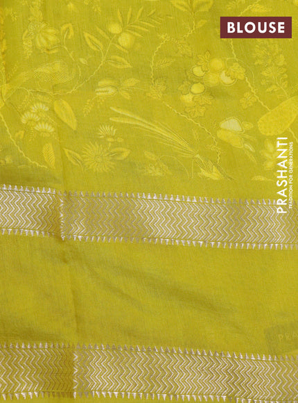 Muslin silk saree yellow and pale yellow with allover prints and rettapet zari woven printed border