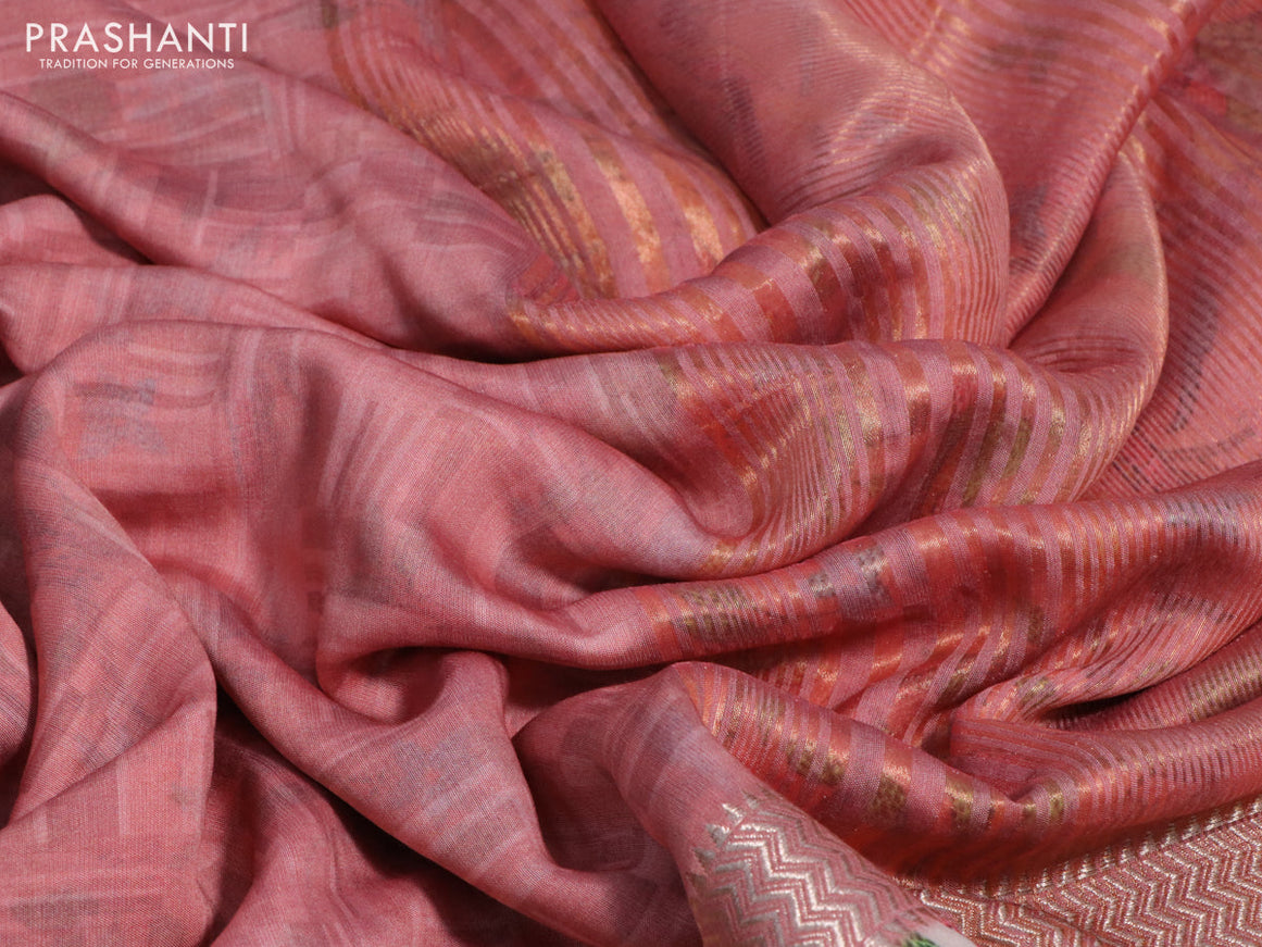 Muslin silk saree peach pink and cream with allover prints and rettapet zari woven printed border