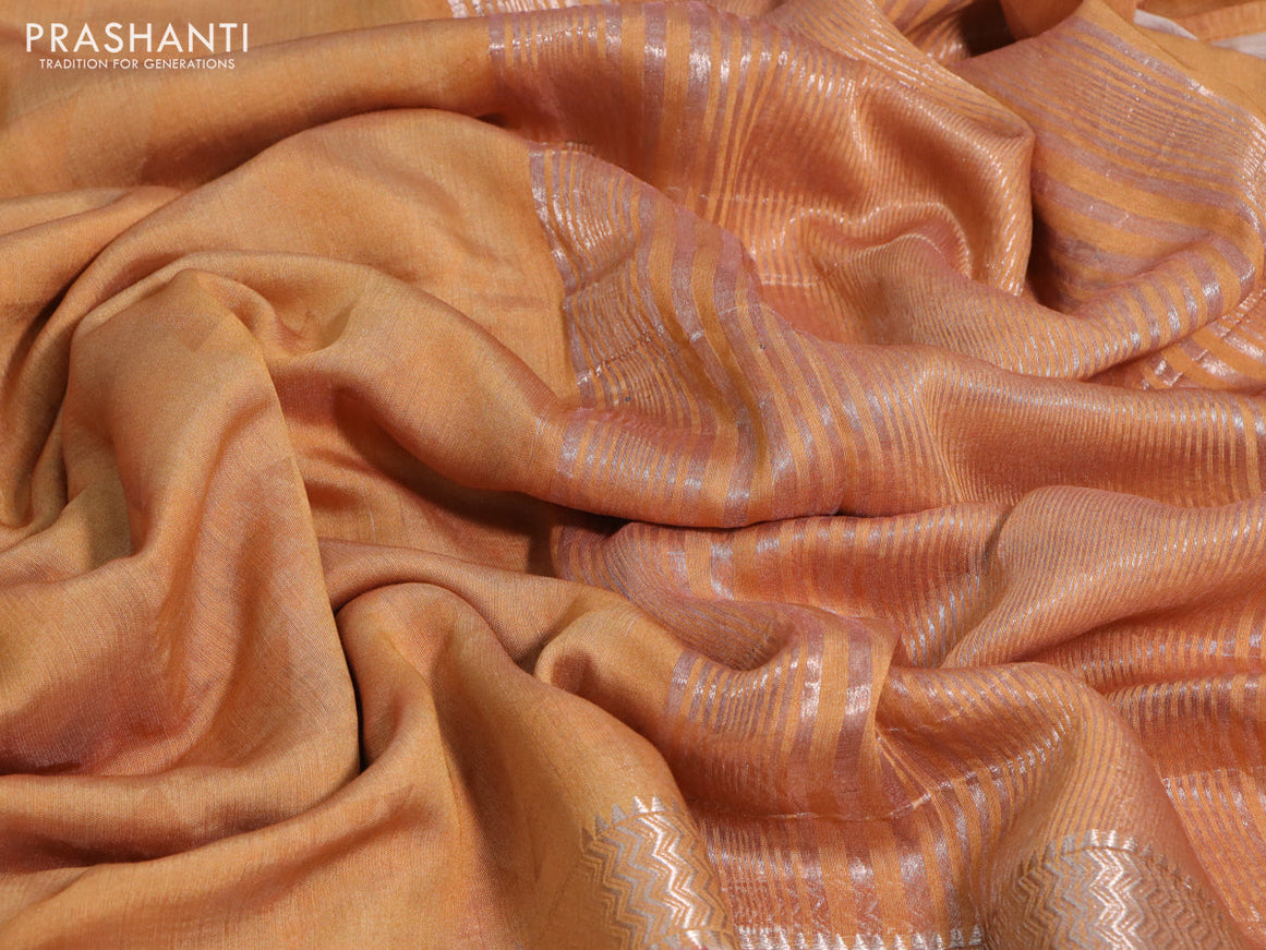 Muslin silk saree orange and cream with allover geometric prints and rettapet zari woven floral printed border