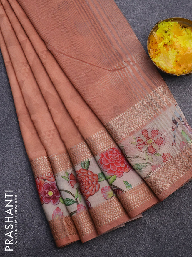 Muslin silk saree peach orange and cream with allover geometric prints and rettapet zari woven floral printed border