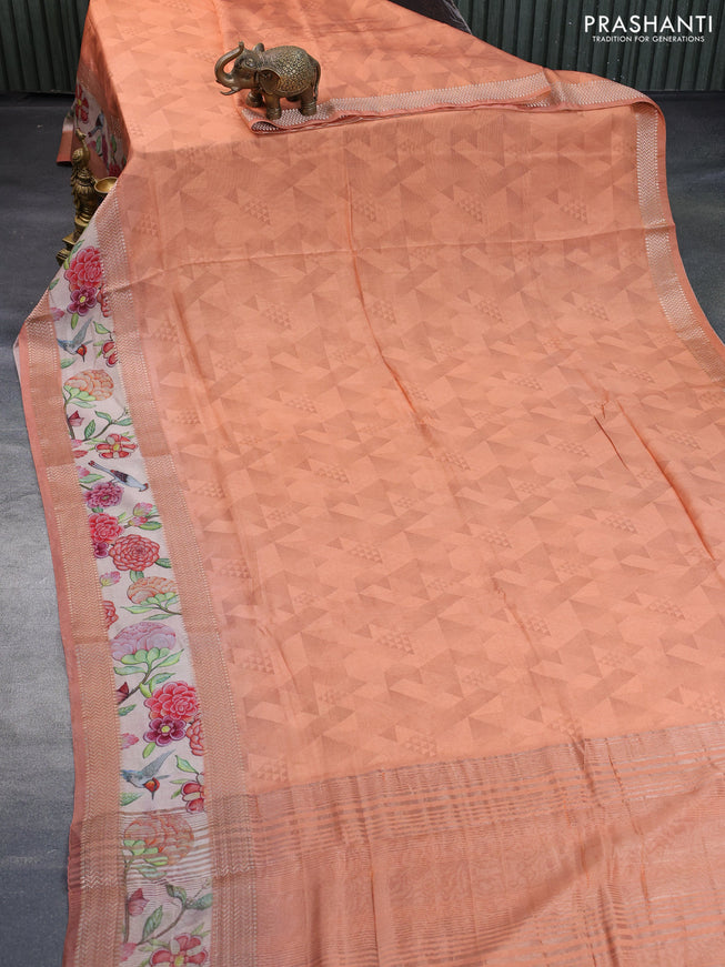 Muslin silk saree peach orange and cream with allover geometric prints and rettapet zari woven floral printed border