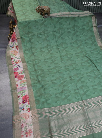 Muslin silk saree green shade and cream with allover geometric prints and rettapet zari woven floral printed border