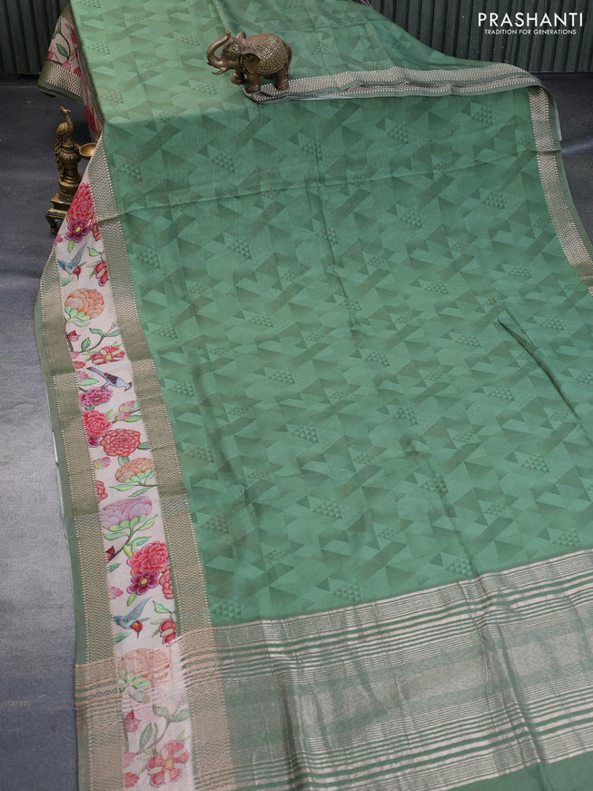 Muslin silk saree green shade and cream with allover geometric prints and rettapet zari woven floral printed border