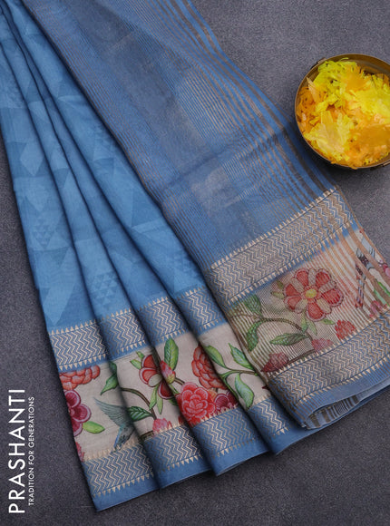 Muslin silk saree blue shade and cream with allover stripes pattern and rettapet zari woven ikat style border