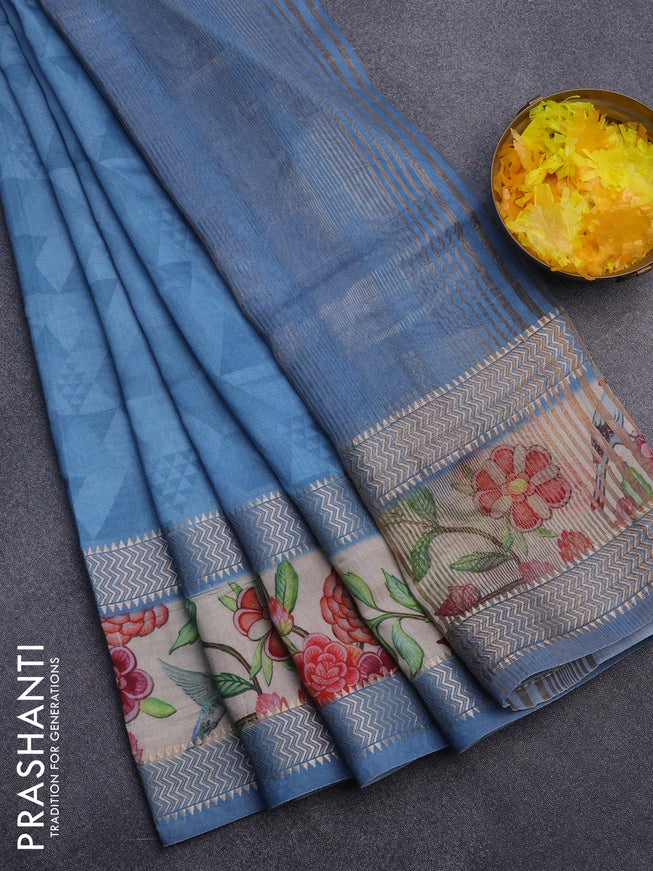 Muslin silk saree blue shade and cream with allover stripes pattern and rettapet zari woven ikat style border