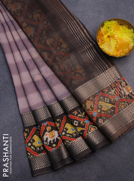 Muslin silk saree rosy brown and brown with allover stripes pattern and rettapet zari woven ikat style border