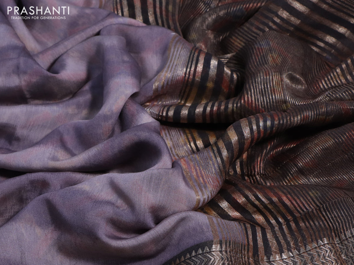 Muslin silk saree grey shade and brown with allover stripes pattern and rettapet zari woven ikat style border