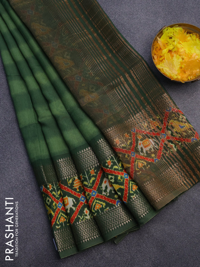 Muslin silk saree green with allover stripes pattern and rettapet zari woven ikat style border