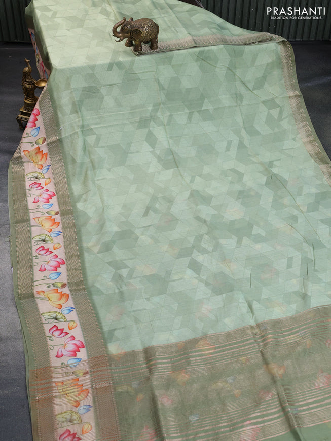 Muslin silk saree pastel green and sandal with allover geometric prints and rettapet zari woven floral printed border