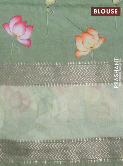 Muslin silk saree pastel green and sandal with allover geometric prints and rettapet zari woven floral printed border