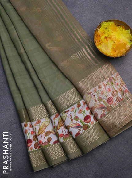 Muslin silk saree green shade and off white with checked pattern and rettapet zari woven printed border