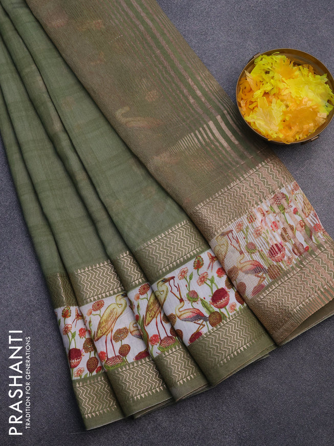 Muslin silk saree green shade and off white with checked pattern and rettapet zari woven printed border