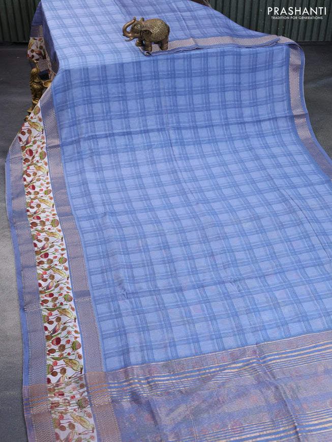 Muslin silk saree blue shade and off white with checked pattern and rettapet zari woven printed border