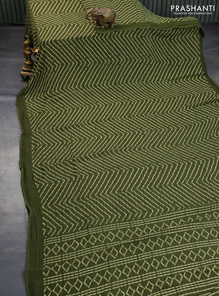 Semi georgette saree sap green with allover prints & sequin work in borderless style