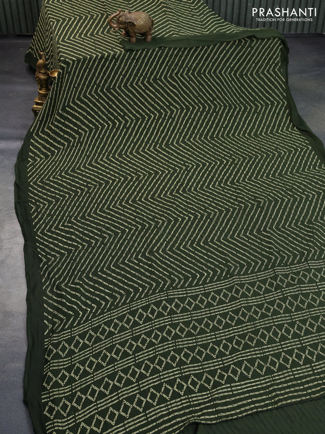 Semi georgette saree dark sap green with allover prints & sequin work in borderless style