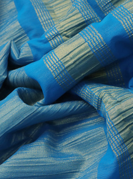 Crushed tissue saree blue with plain body and paisley zari woven border