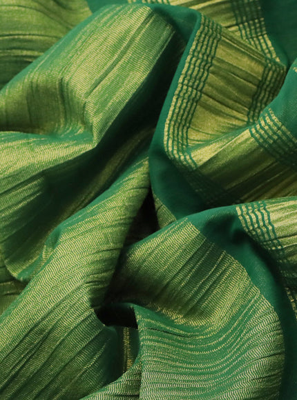 Crushed tissue saree green with plain body and paisley zari woven border