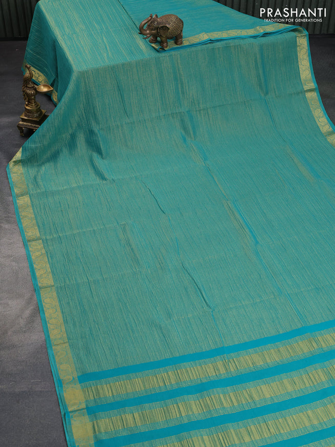 Crushed tissue saree teal blue with plain body and paisley zari woven border