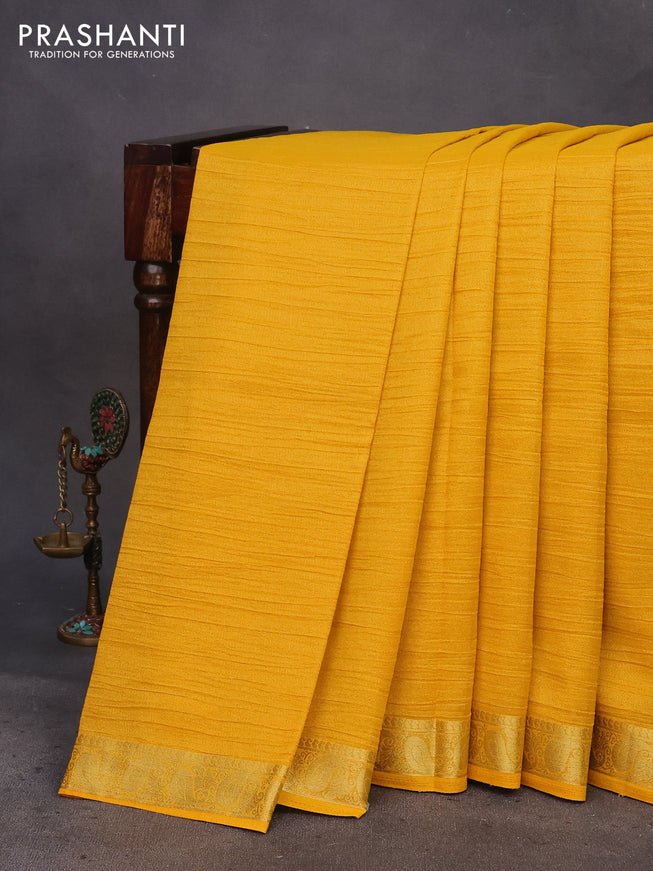 Crushed tissue saree yellow with plain body and paisley zari woven border