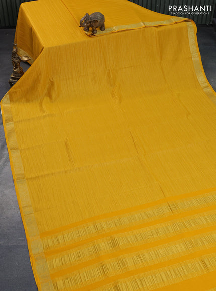 Crushed tissue saree yellow with plain body and paisley zari woven border